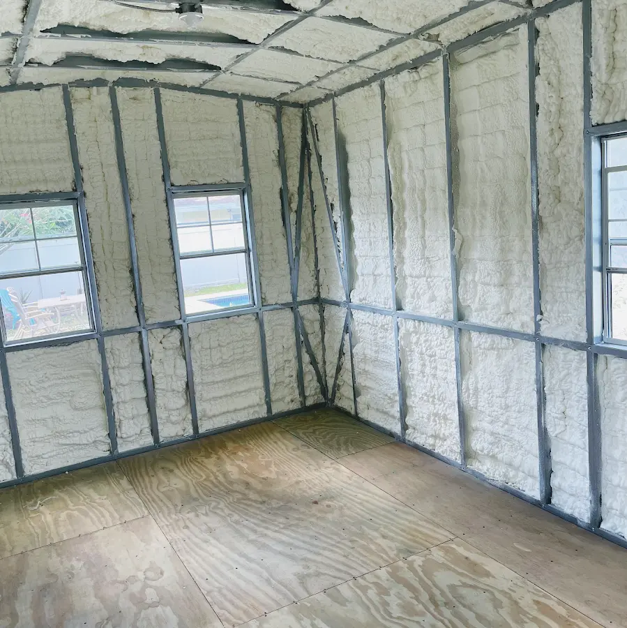 Closed-cell spray foam insulation applied to wall cavities in a residential project in Kernersville